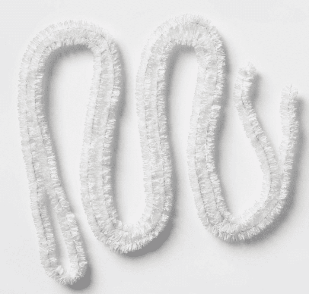 You can't forget the tinsel when decorating for Christmas. This mini tinsel garland from Target is perfect for any spot in the house. It is only $3, so perfect for your wallet. Very Neutral to go with anything.