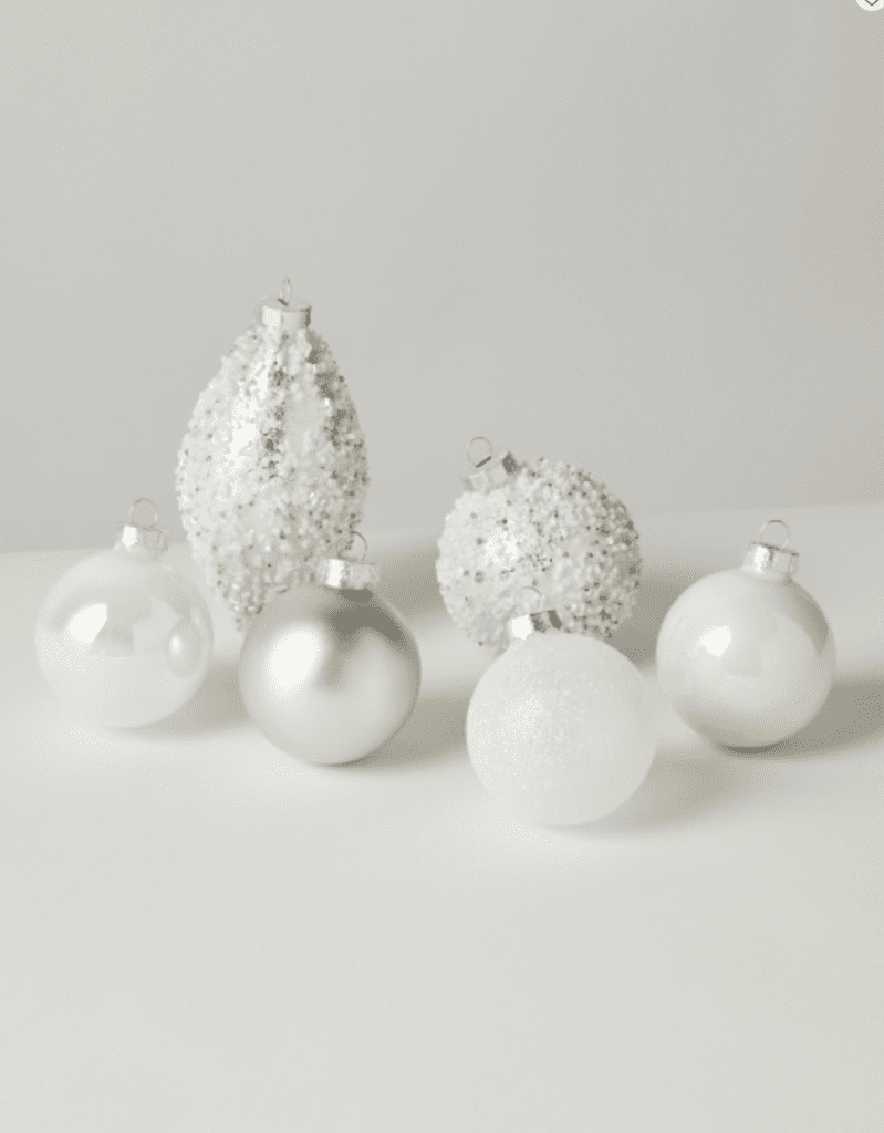 These assorted ornaments are great for decorating your Christmas tree. These particular ones linked are from HomeGoods. You could order them online or try to find them in-store. Online they are sold for $19.99 and come with twenty-four ornaments. Neutral!