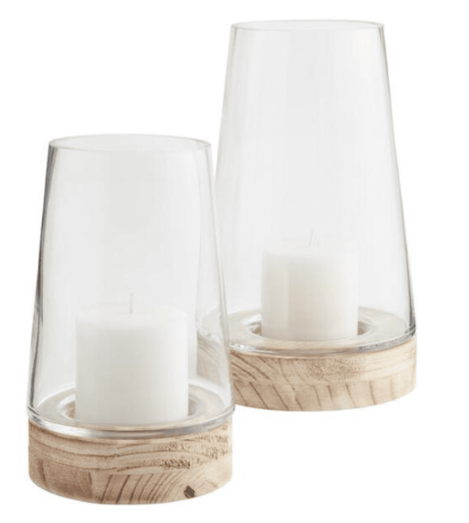 These tapered glass and wood hurricane candle holders come in two different sizes: small and large and range from $22.99-$24.99 from World Market. These would make a great addition to your dining table with the Christmas tree tea lights or on your mantel. Neutral.