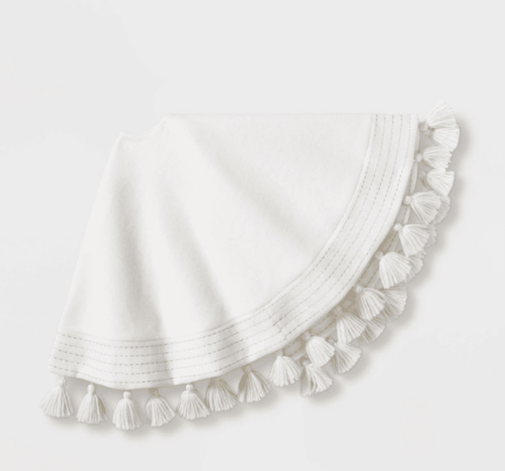 This cream Christmas tree skirt is very neutral and cute. It would go great with the tree skirt from Walmart shown earlier in this post. You can buy this tree skirt at Target for $30.