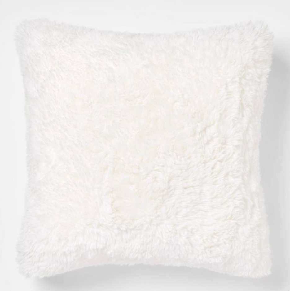 fuzzy white pillow looks like restoration hardware. restoration hardware pillow