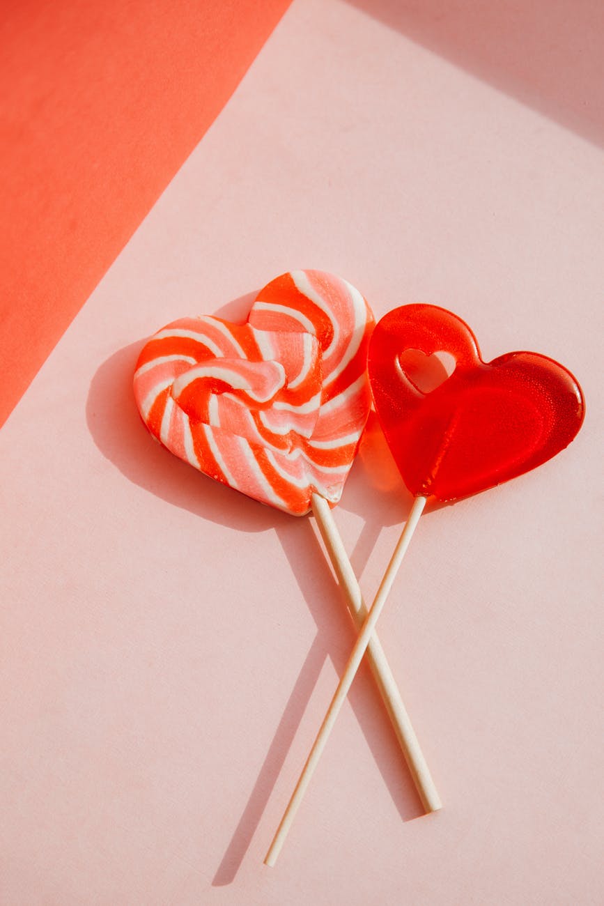heart shape lollipops in orange color