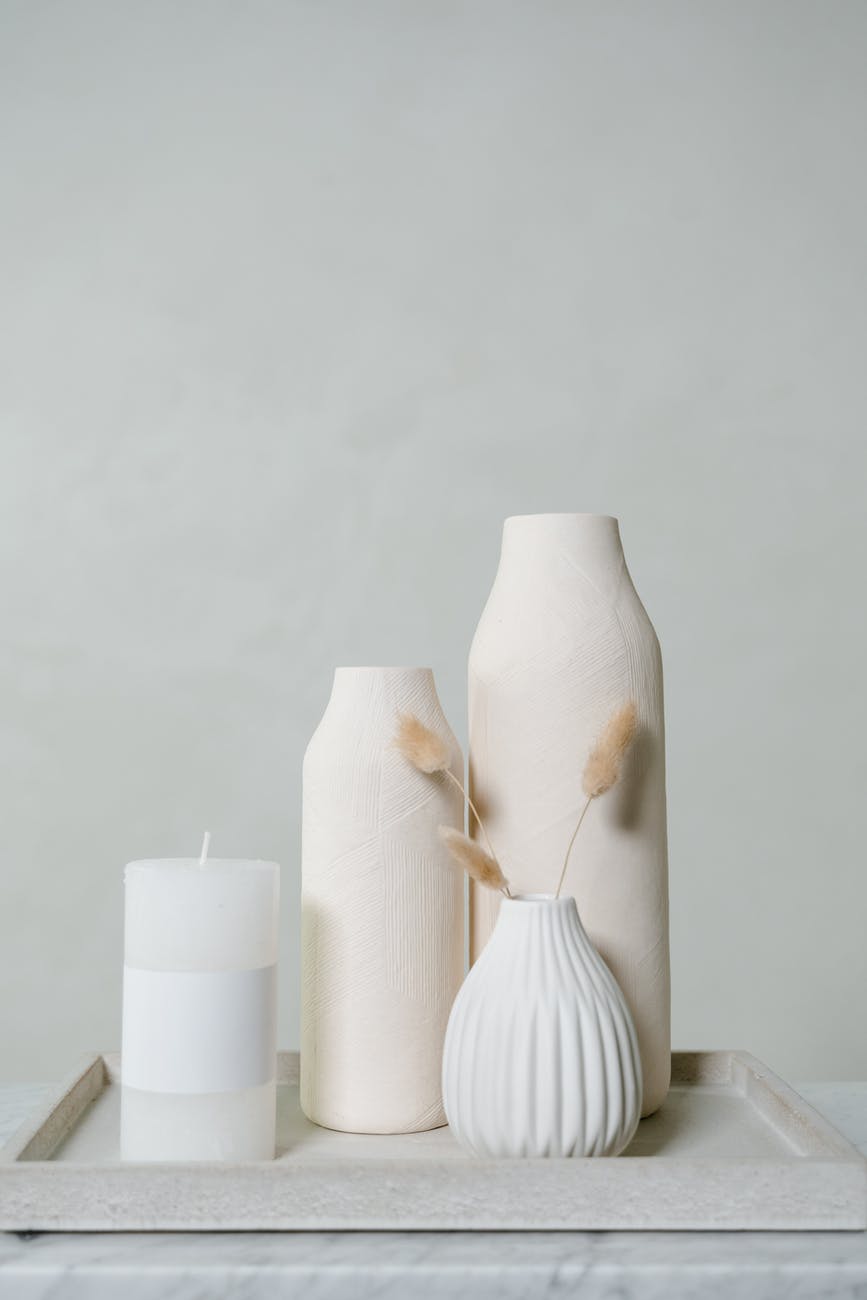 ceramic vases and a candle